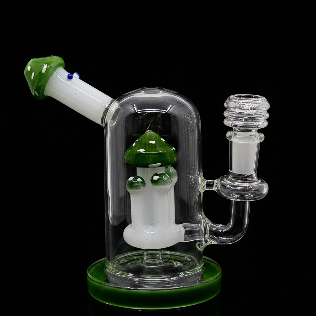 Fungi themed mushroom dab rig made from borosilicate glass with green accents and innovative percolator.