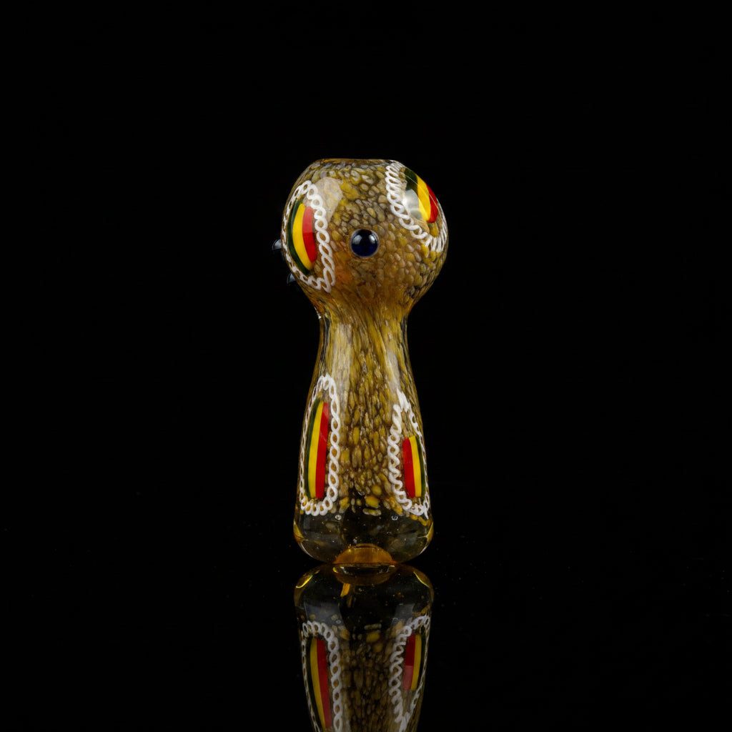 Golden Rasta Boro 5" glass hand pipe with vibrant yellow, red, and green design.