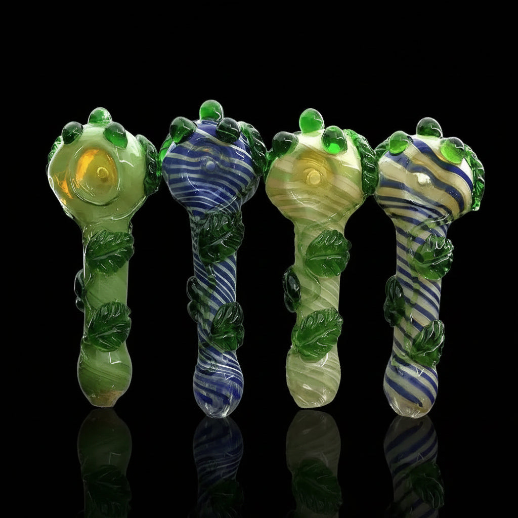 5.5" Glass Green Leaf Spoon Handmade Pipe with swirling colors and leaf design.