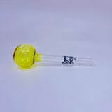 Glass smoking accessory with yellow bowl and blue logo on a white background