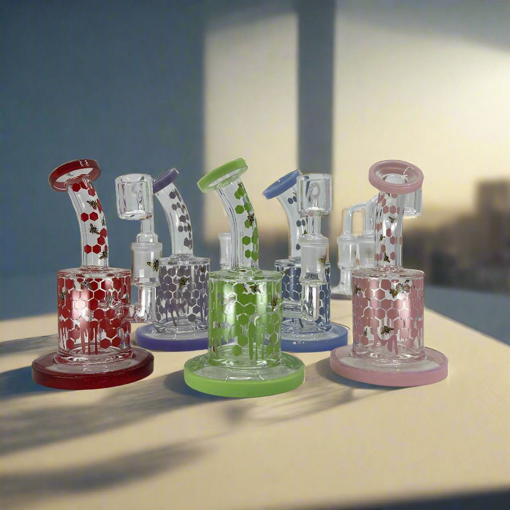 Colorful Honey Bee Dab Rig collection with floral designs.