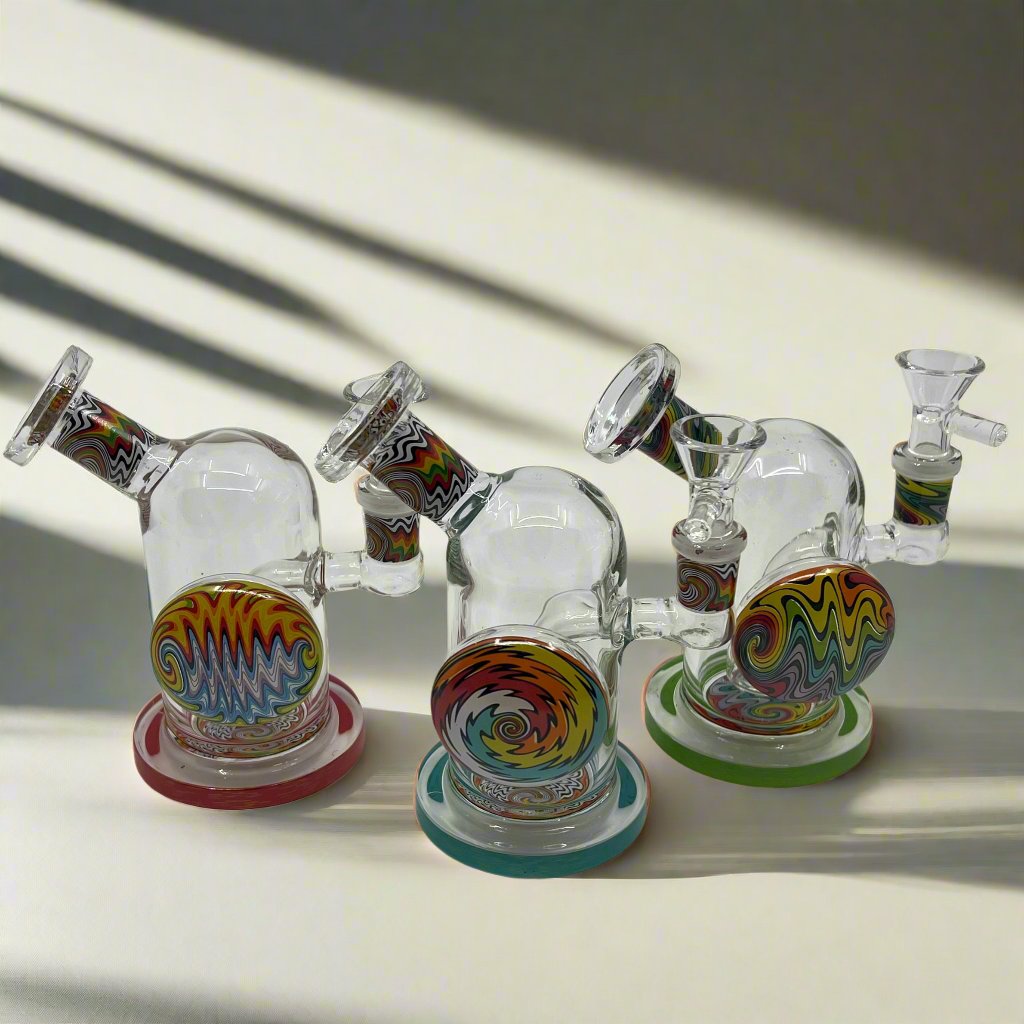 Egyptian art Dab Rig with intricate glass designs.