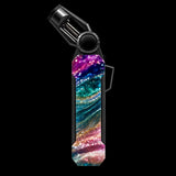 A black pocket lighter with a vibrant, multicolored galaxy glitter skin on the body, shown against a plain white background.