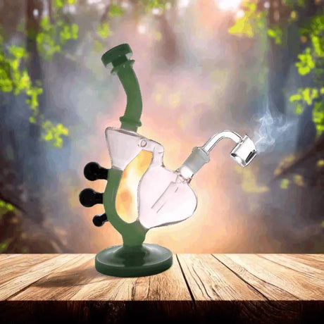 Handmade Recycler Heart Shape Bong 8" on wooden table, forest background.