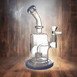 8 Inch Showerhead Bent Neck Dab Rig with blue accents on wooden background.