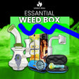 Essential Weed Box with dab rig, glass hand pipe, hemp wrap, lighter, grinder, and accessories.