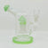 Fungi themed mushroom dab rig made of clear borosilicate glass with green accents for smooth filtration.