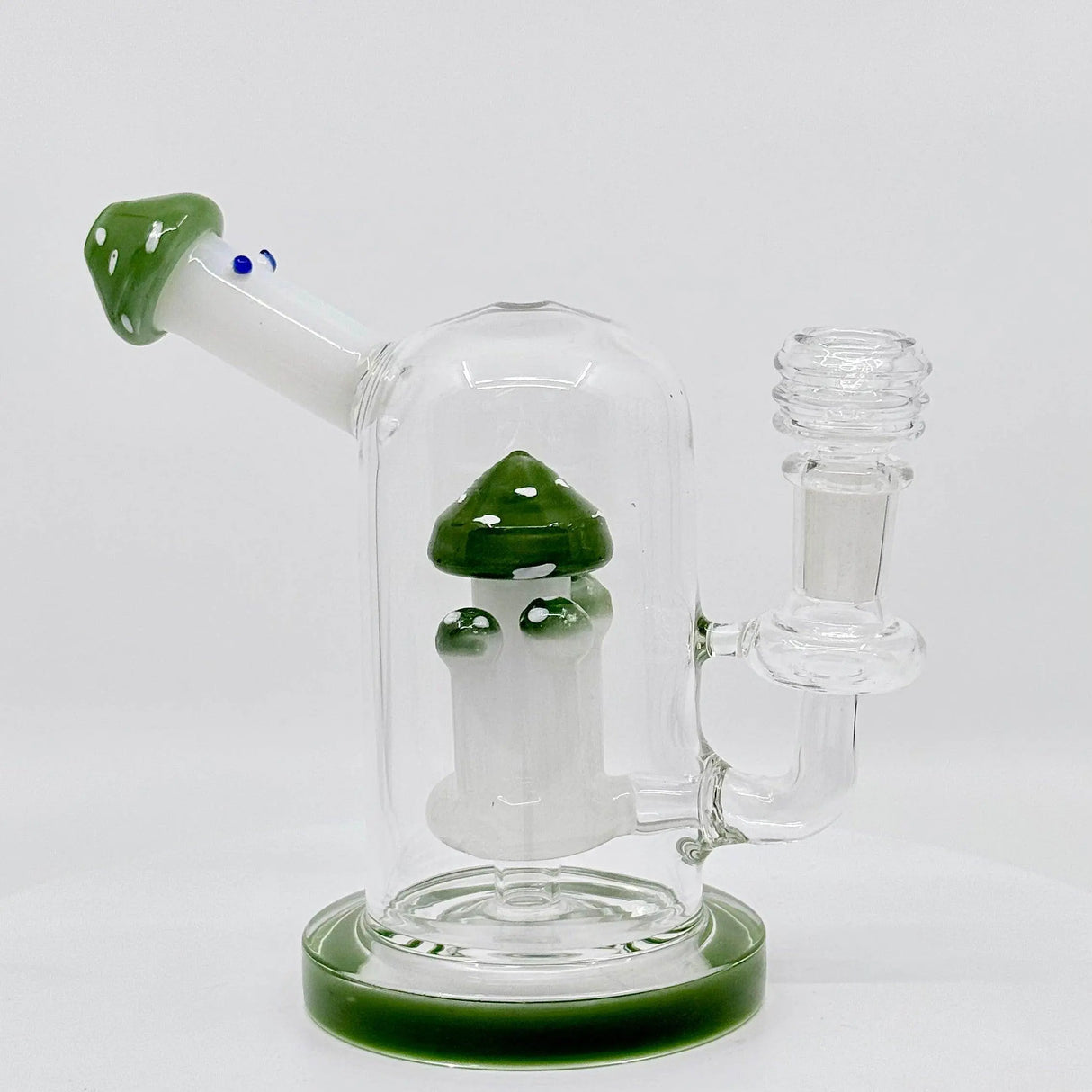 Fungi themed mushroom dab rig made from borosilicate glass with green accents and innovative percolator.
