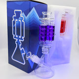 Glass water pipe with a blue box in the background