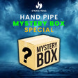 Hand Pipe Mystery Box SPECIAL packaging with a mysterious question mark design against a smoky blue background.