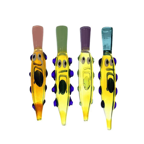 5.5" handmade glass hand pipe with unique face design and colorful accents, compact and portable for smoking enthusiasts.