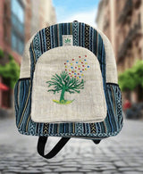 Hemp embroidery backpack with artisan design, eco-friendly fabric, and spacious interior on an urban background.