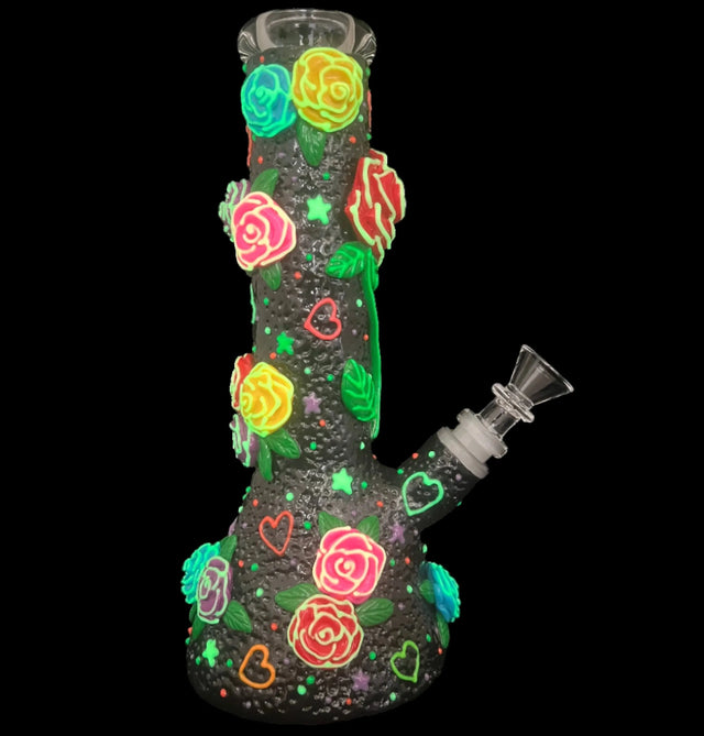 Limited edition Mysterious Island glow-in-the-dark smoking bong with colorful floral design.