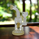 Bent Neck Dab Rigs with Animal Insult Design on table, high-quality borosilicate glass.