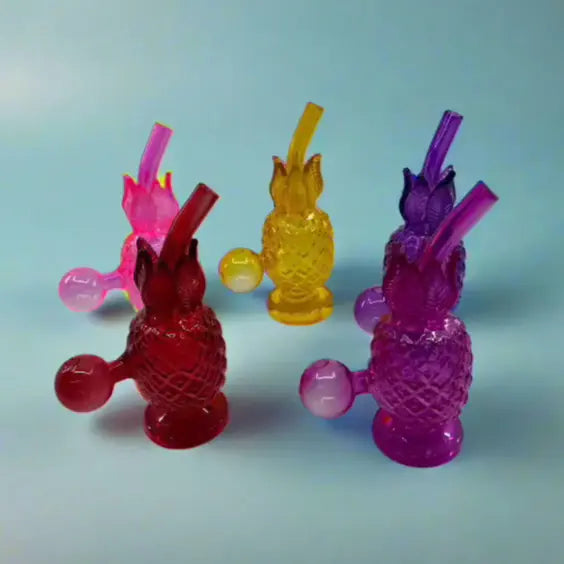 Unique design 6 inch glass pineapple oil dab rig in various colors.