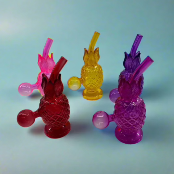 Unique design 6 inch pineapple-shaped glass dab rigs in various colors.